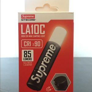 Supreme/Nitecore Black mini retractable flashlight